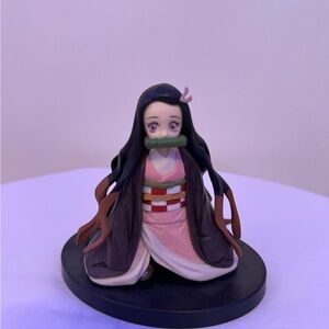 Anime Figure in Pink and Brown Outfit